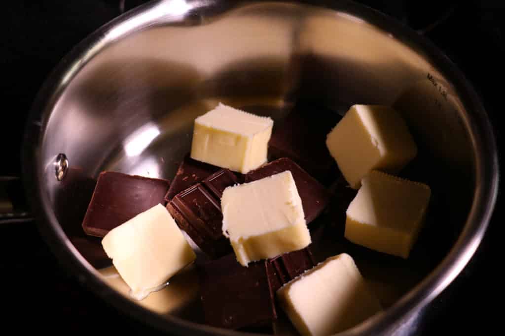 You can definitely use a double broiler to melt your chocolate and butter together here, it is less risky. Or, you can be a rebel like me and just toss it in the pot together over the lowest heat possible and thank your lucky stars when it comes out all smooth and shiny. 