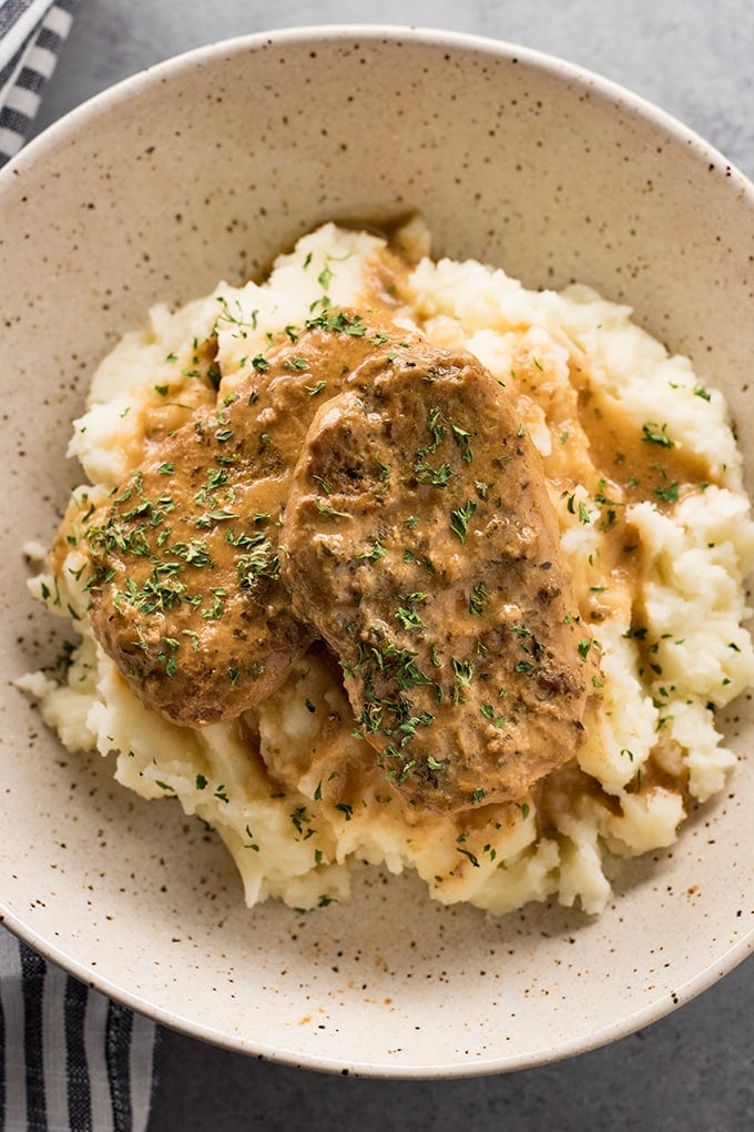 Slow cooker pork chops are made easy in your crockpot smothered in a creamy ranch gravy