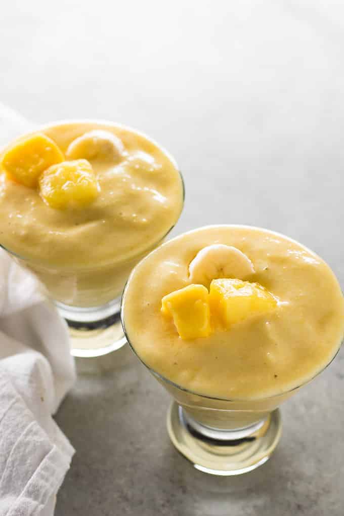 tropical breakfast smoothies with mango banana and pineapple
