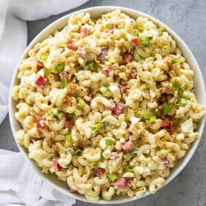 macaroni salad in a white serving bowl