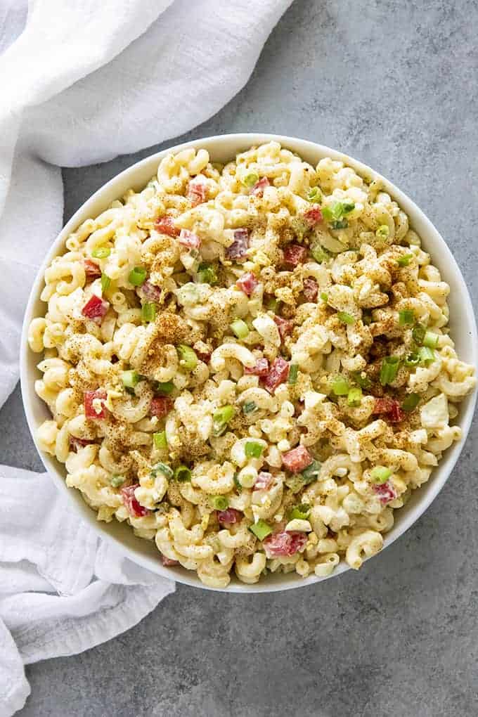 macaroni salad in a white serving bowl