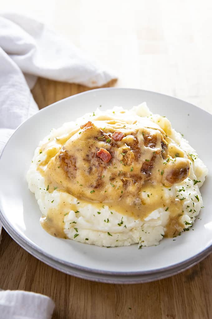 Creamy One Skillet Smothered Chicken Thighs - Dizzy Busy and Hungry!