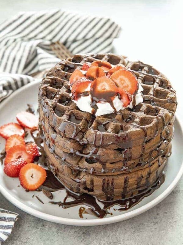 chocolate waffles stacked on a plate