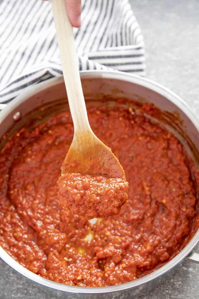 pizza sauce on a spoon