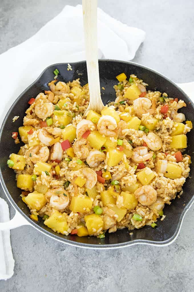 shrimp fried rice with pineapple in skillet