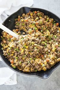 ground beef fried rice in a spoon