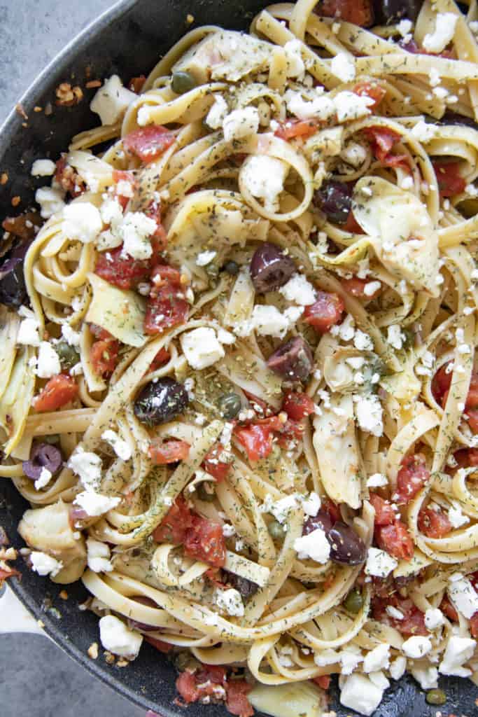 close up of greek fettuccine pasta in a skillet