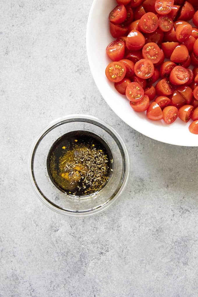 dressing for tomato salad in a small bowl
