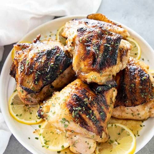 Easy Grilled Chicken Thighs (Bone-In With BBQ Rub) - Sip Bite Go