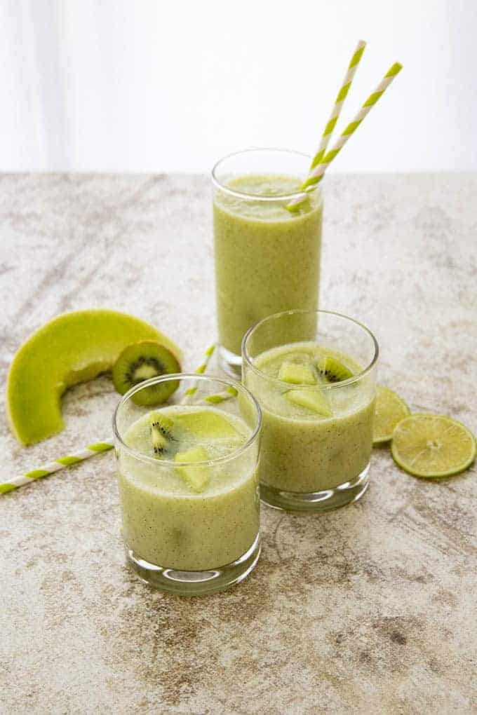 kiwi melon smoothie in three glasses