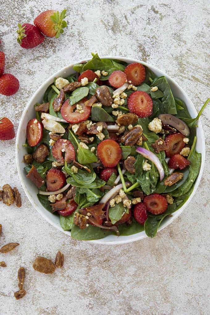 strawberry spinach salad in a bowl