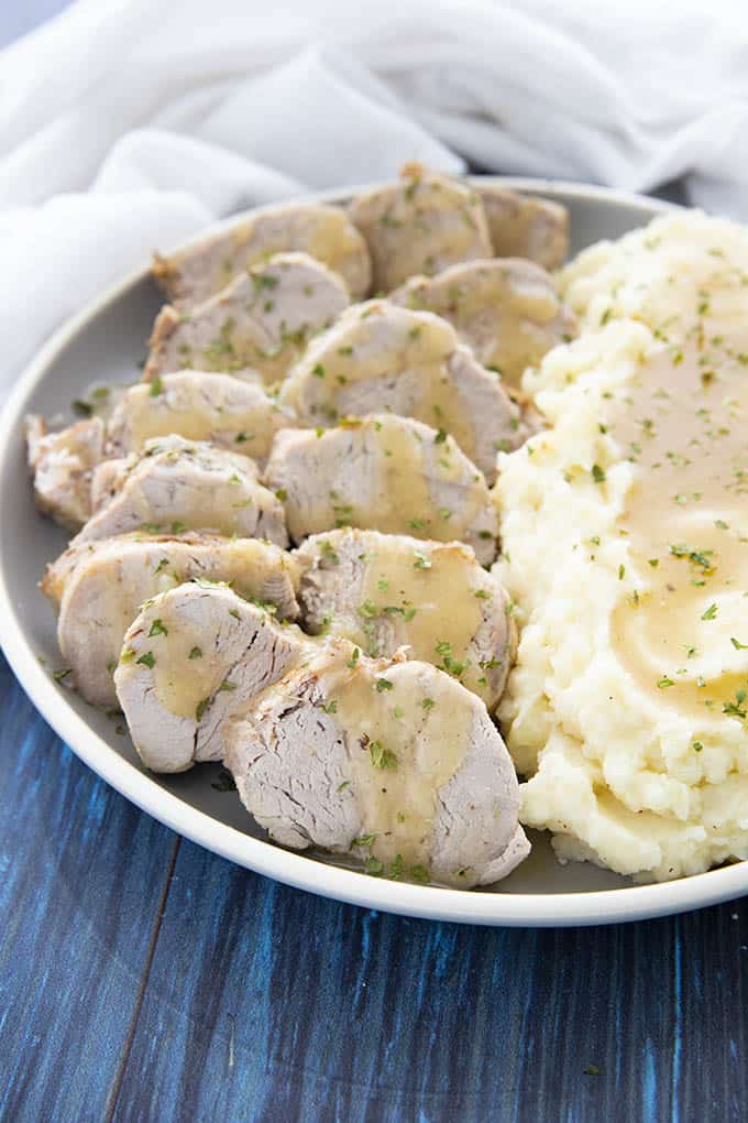 instant pot pork tenderloin and potatoes on a plate