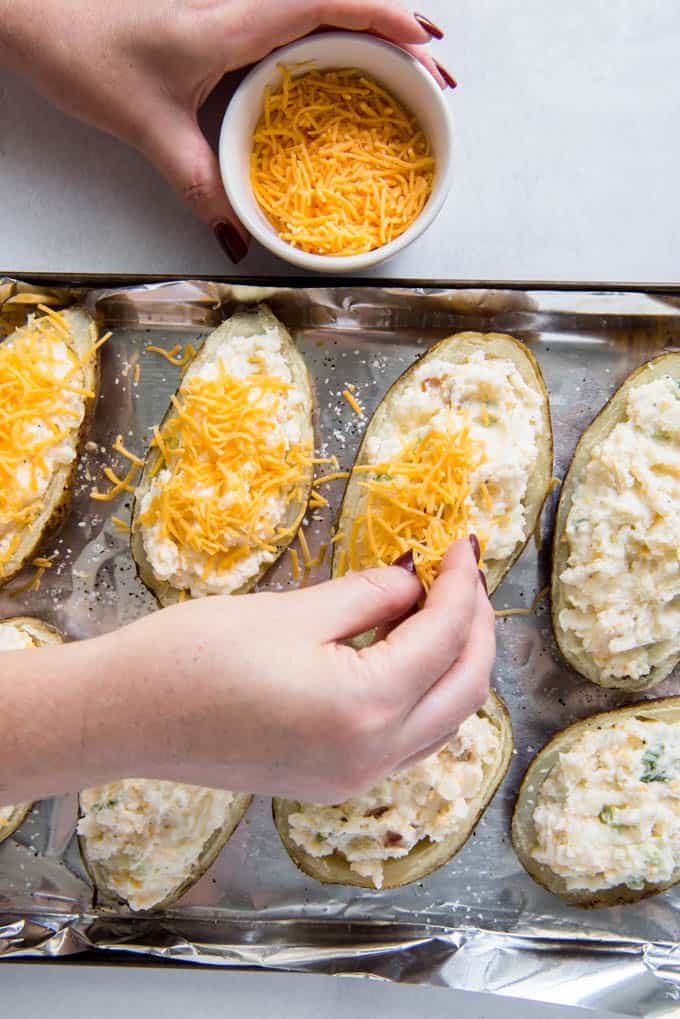 sprinkle cheese on twice baked potatoes