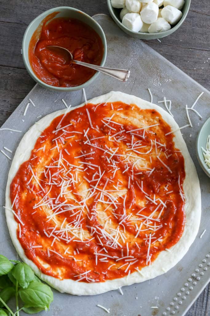Pizza dough with sauce for Margherita Pizza 