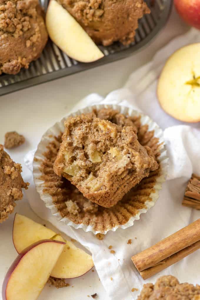 a bite taken out of apple muffins