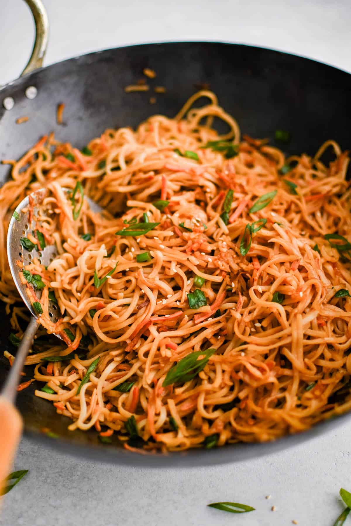 pan fried noodles in a wok