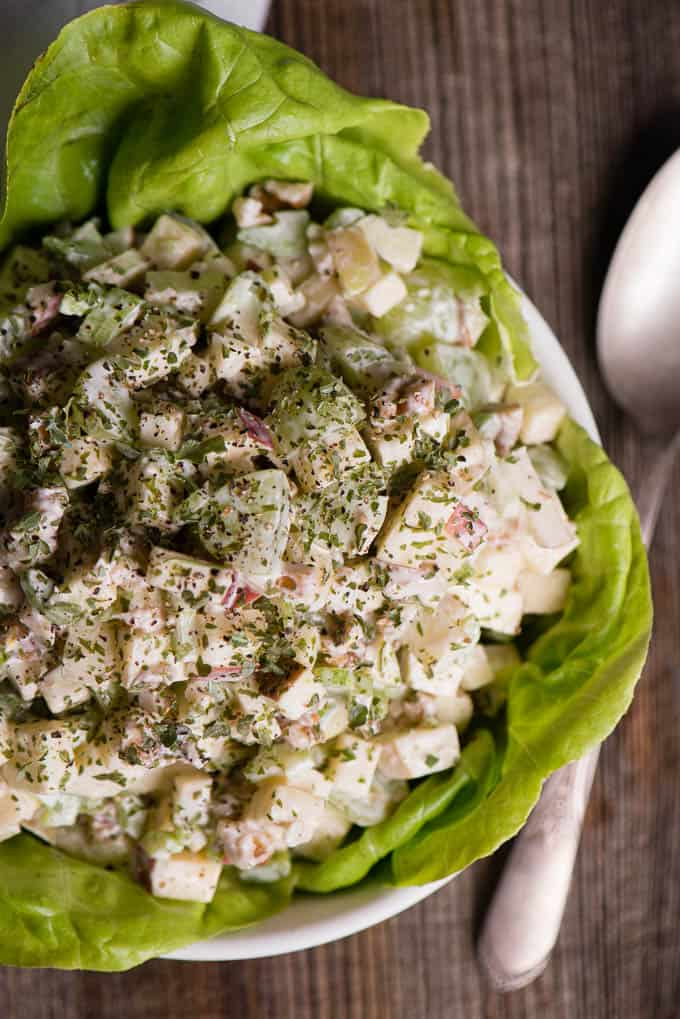 homemade waldorf salad in white bowl