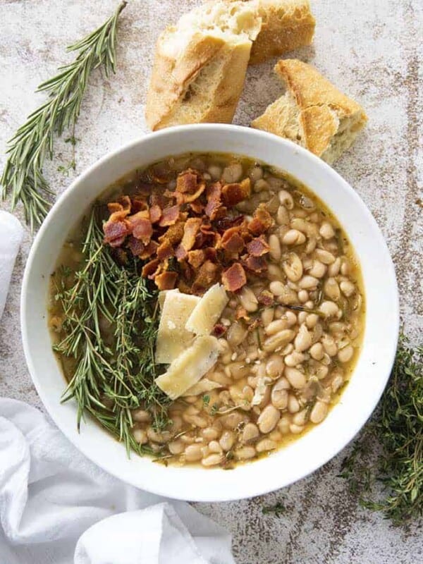 white bean soup with bacon in bowl