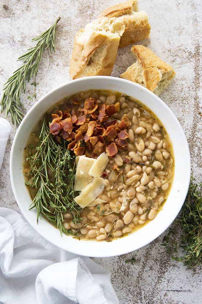 white bean soup with bacon in bowl