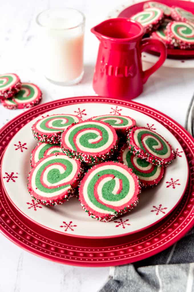 An image of swirled Christmas sugar cookies on a festive plate.