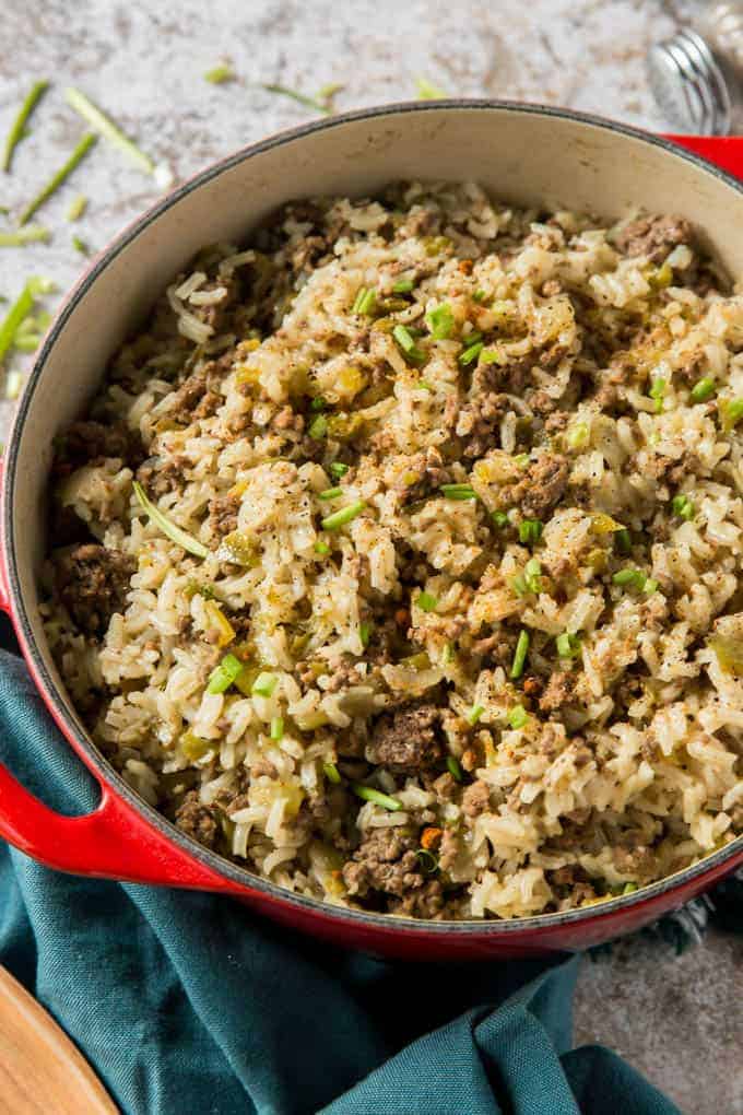 dirty rice made in a dutch oven with cajun seasoning, beef and a few simple ingredients
