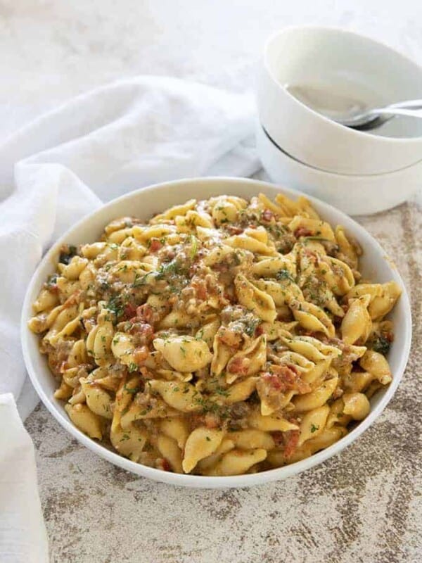 instant pot creamy italian mac and cheese in a white bowl