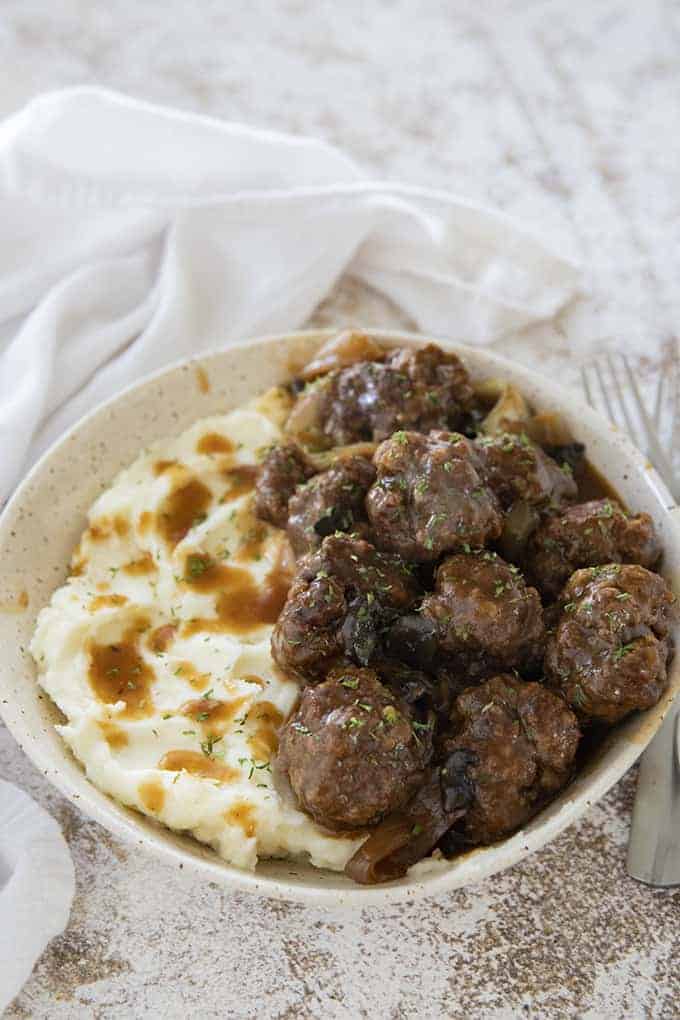 meatballs and gravy in bowl 