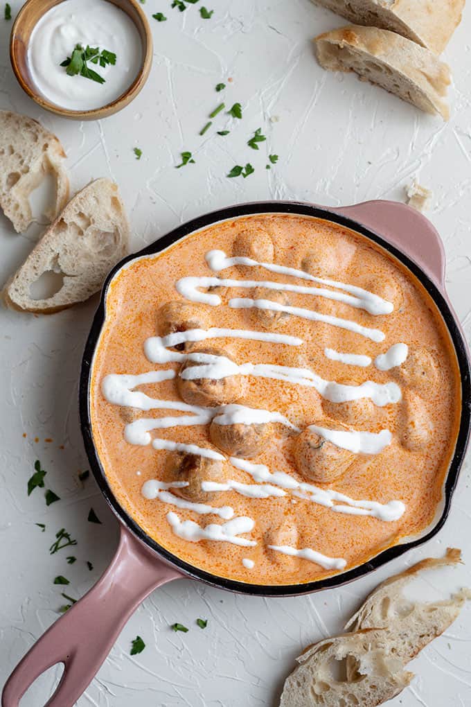 creamy buffalo chicken meatballs in a pan