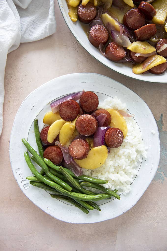 kielbasa and apples on a plate