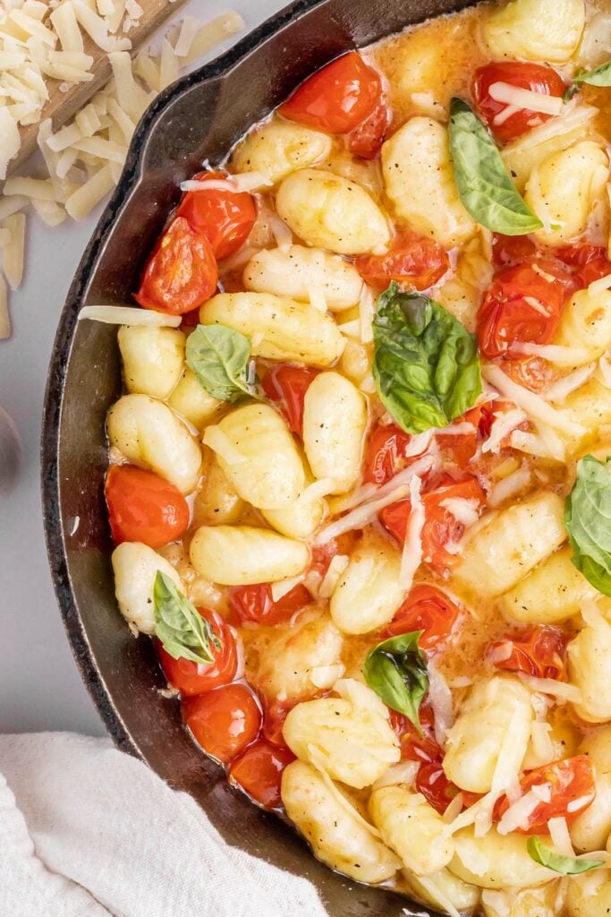 photo of gnocchi with brown butter sauce and tomatoes
