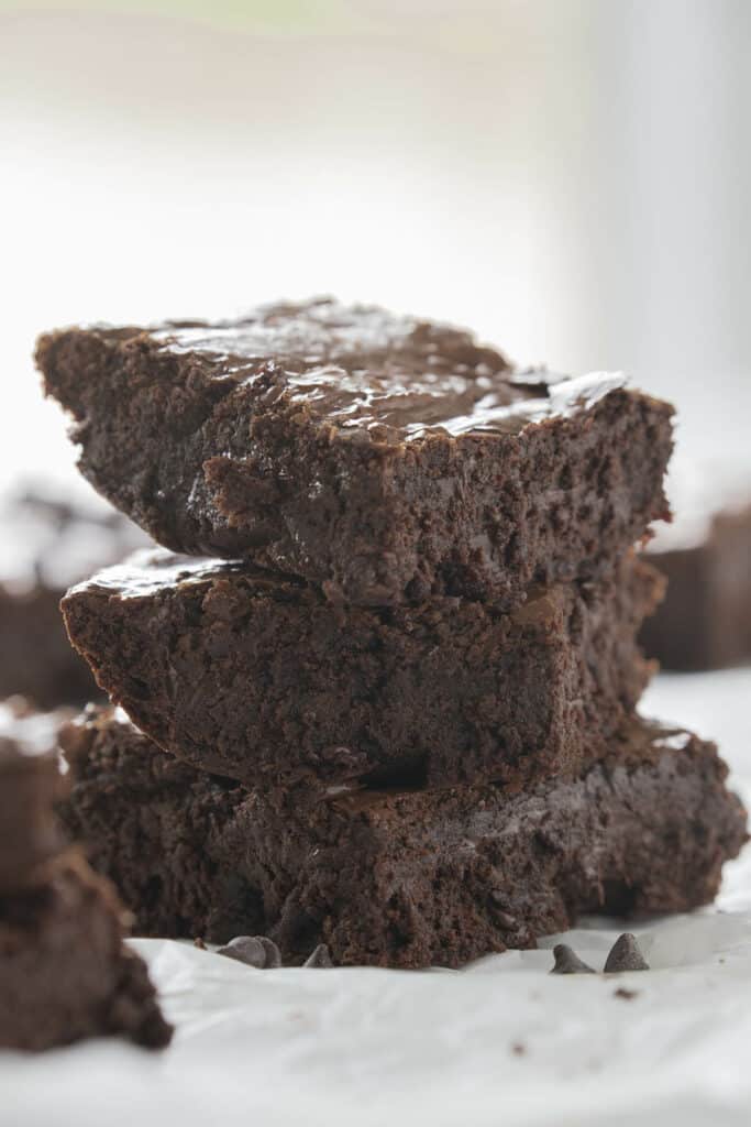three brownies from the best brownie recipe stacked