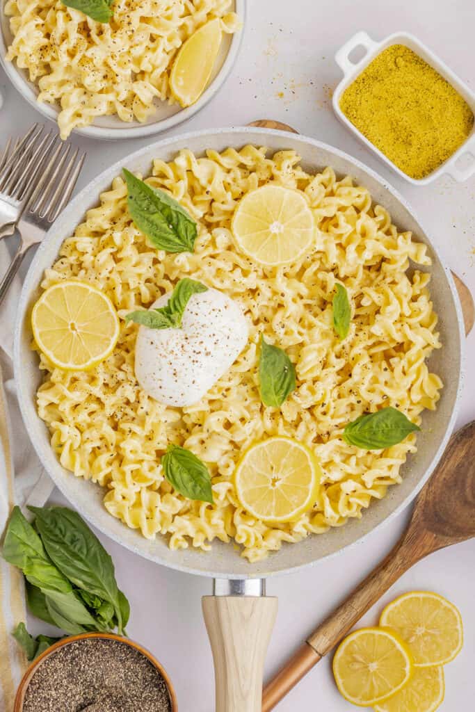 lemon pepper pasta with burrata in a skillet