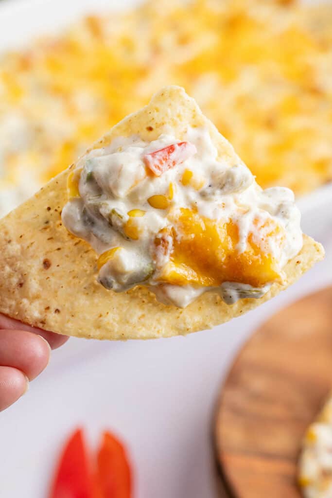 cheesy green chile dip on a chip
