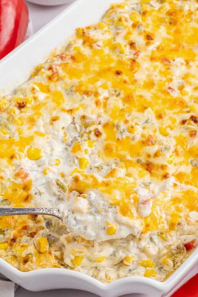 cheesy green chili dip in a white pan