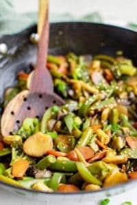 stir fried vegetables in a pan