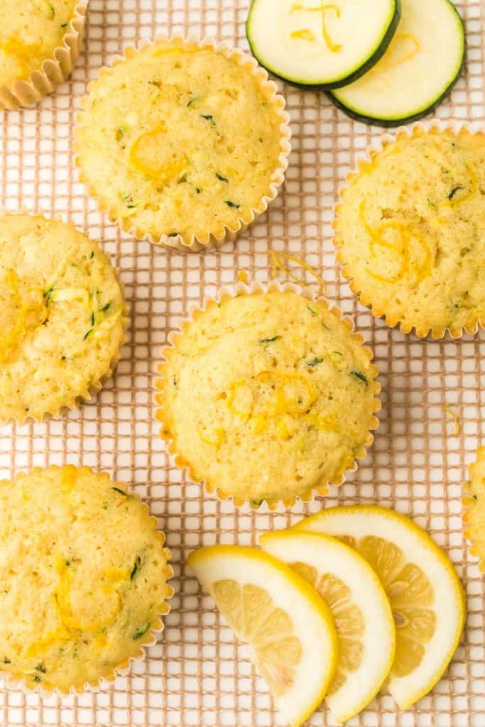 lemon zucchini muffins on a baking rack