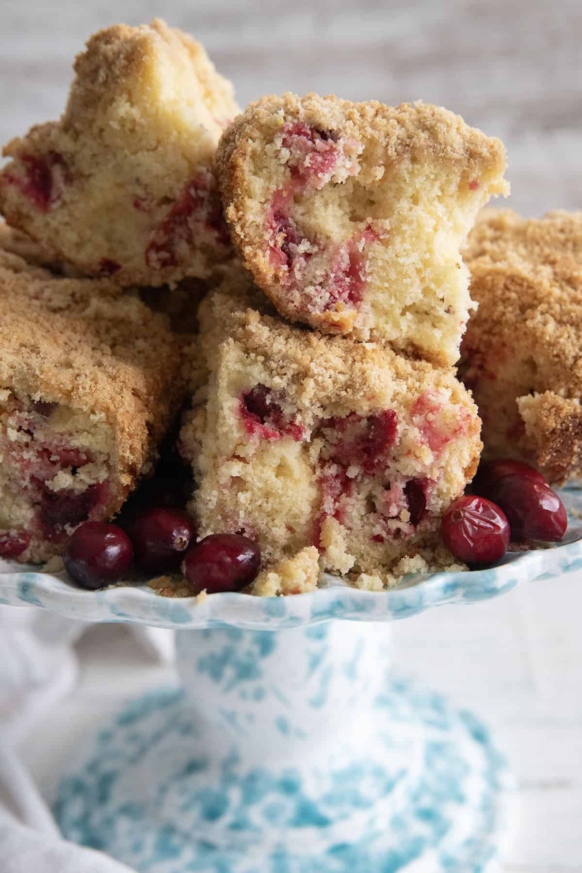 cranberry coffee cake on a cake plate