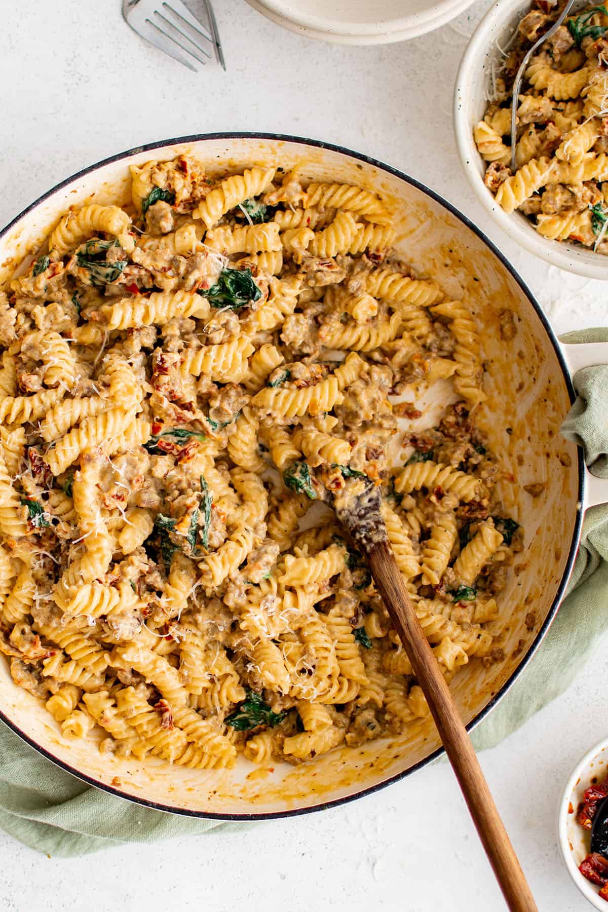 rotini with sausage and cream sauce in a pot