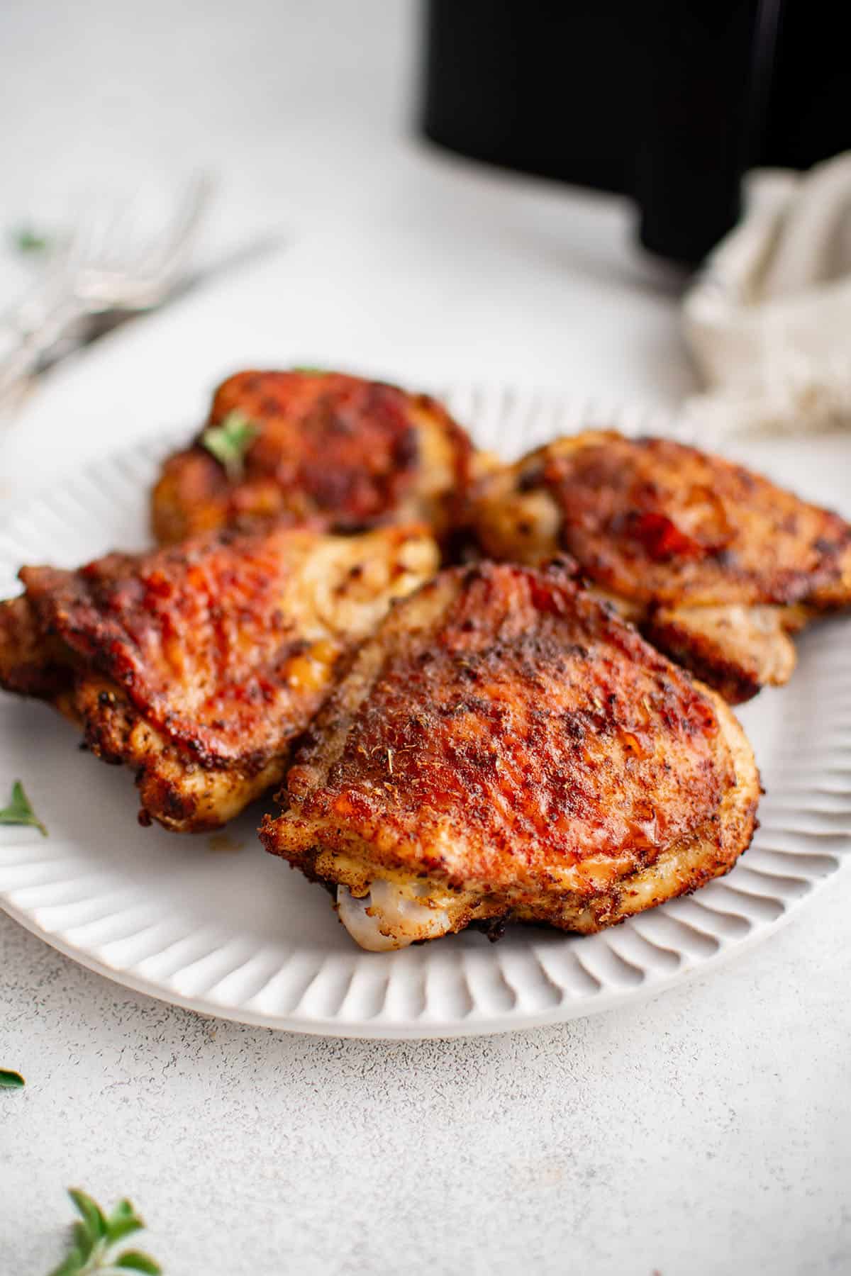 chicken thighs made in the air fryer on a plate