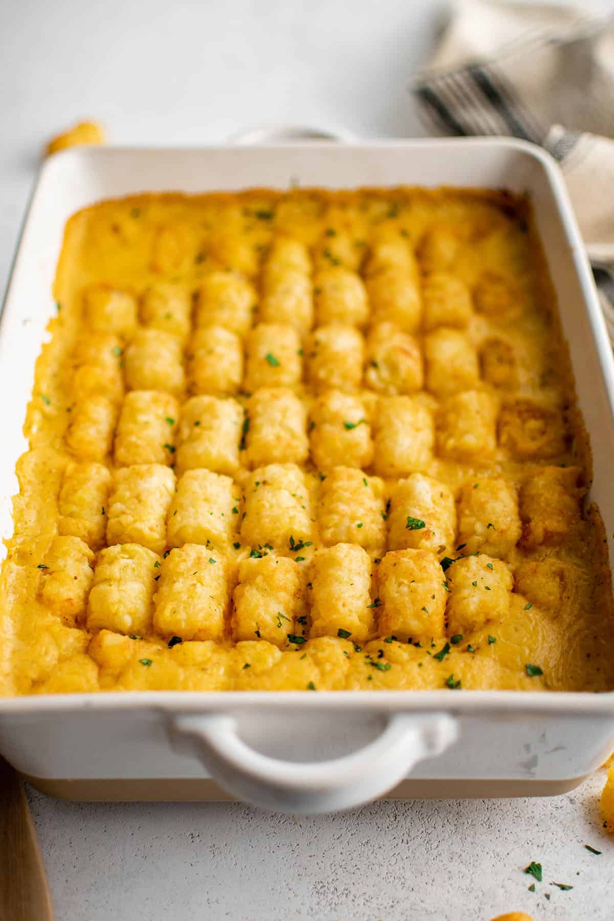 chicken tater tot casserole in a baking dish