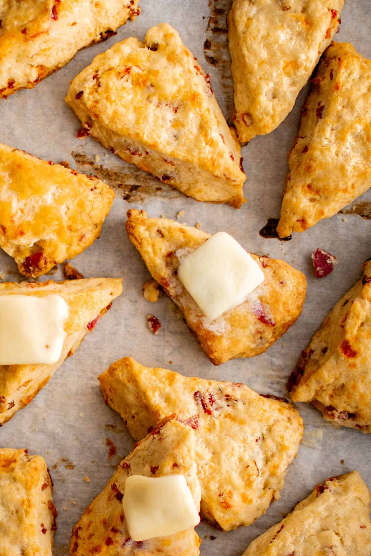 cheese scones with bacon on a baking sheet