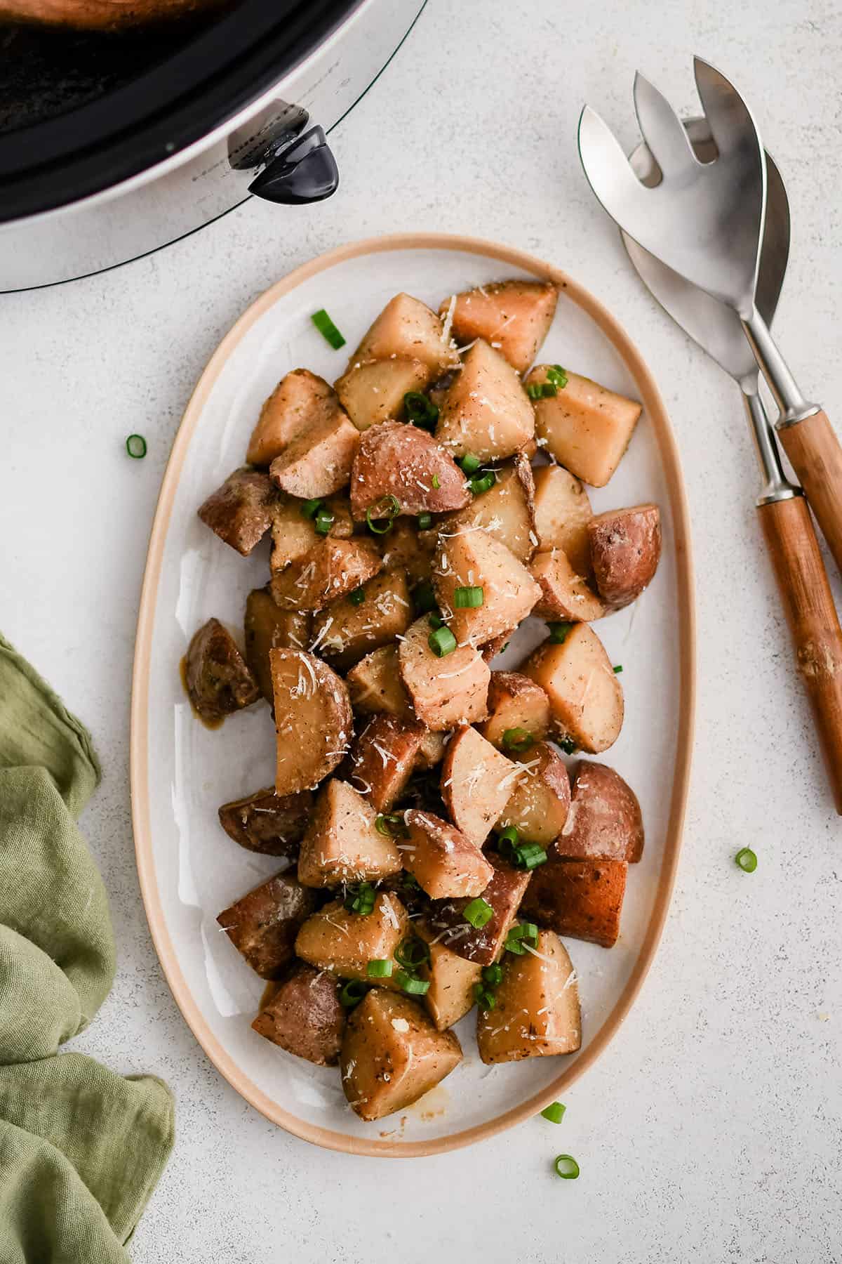 potatoes roasted in the crockpot on a plate
