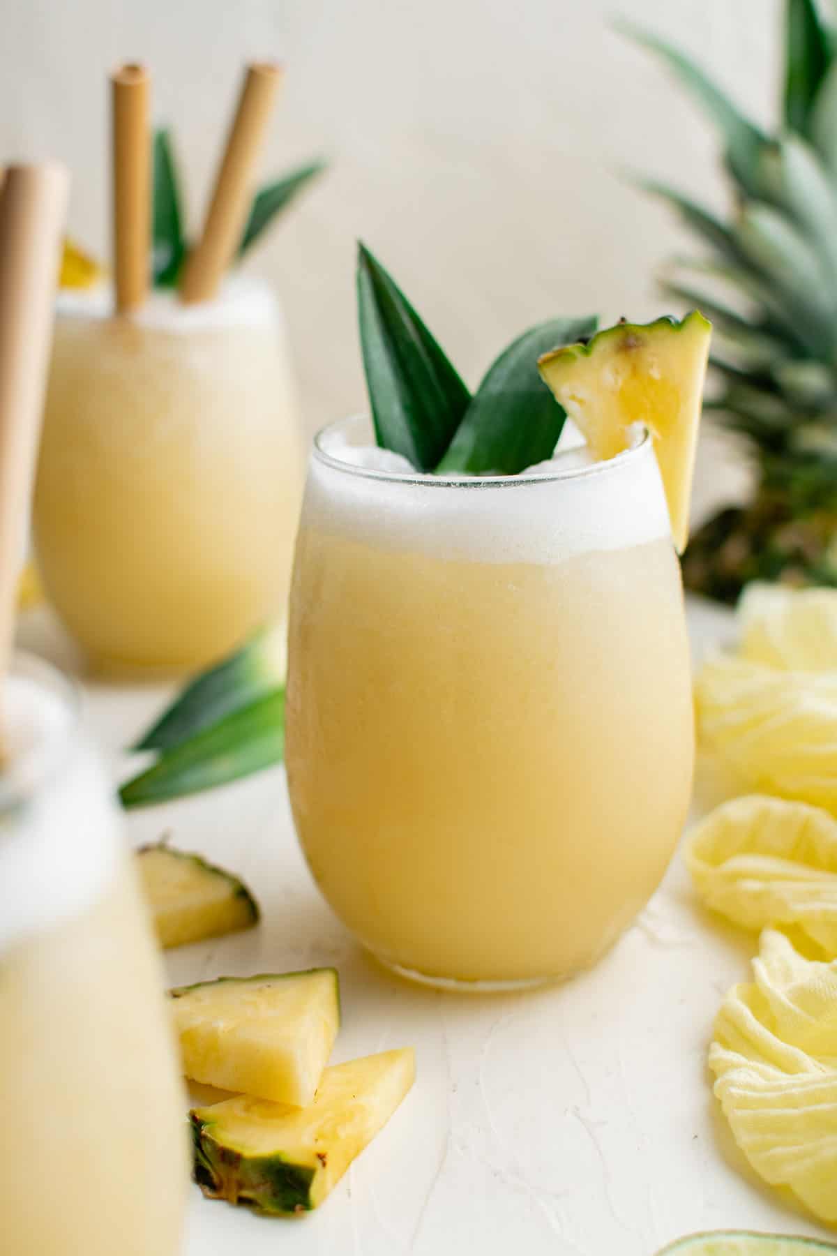 pina colada cocktail in a glass with pineapple