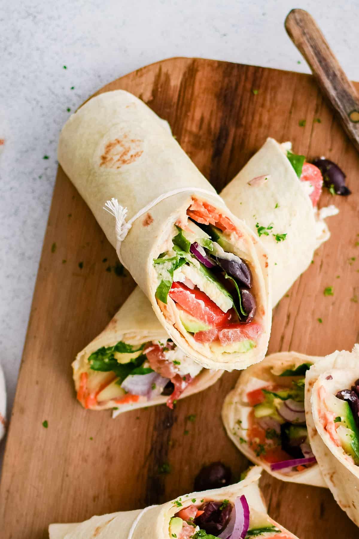 photo of tortilla wraps with hummus and veggies