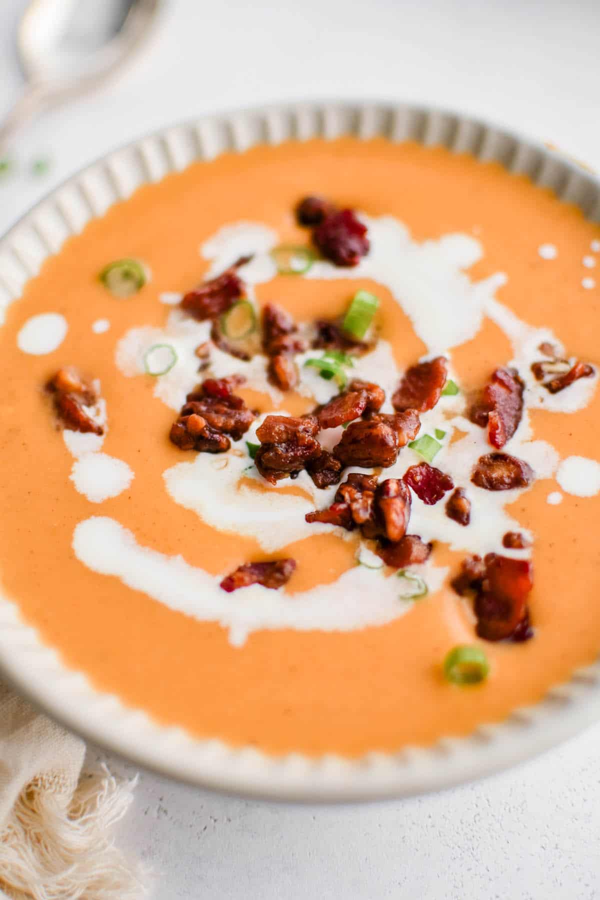 Sweet potato Soup with pecan bacon topping