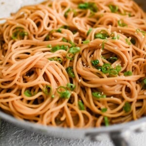 image of teriyaki noodles in a skillet