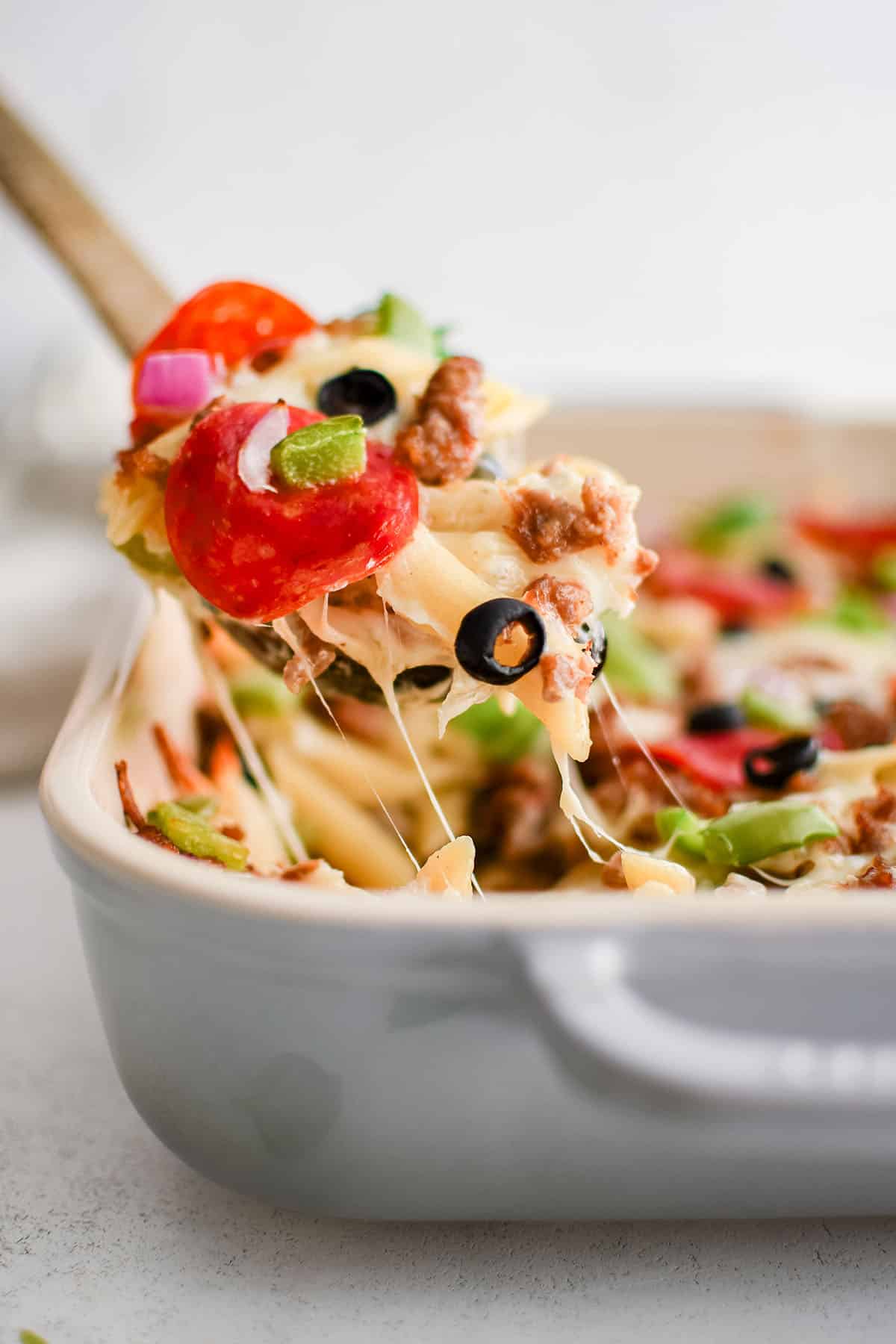 white pizza pasta on a serving spoon