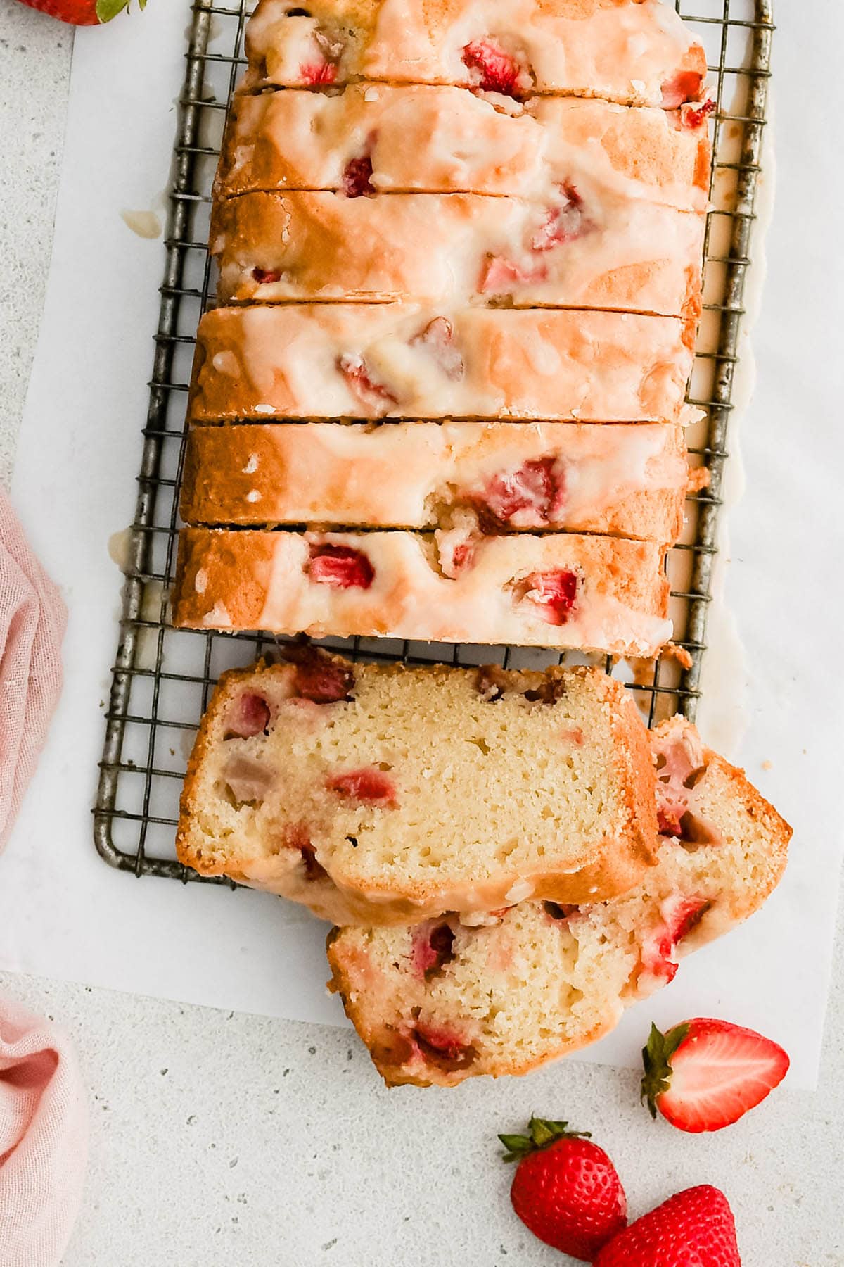 birds eye view of strawberry bread on a cooling rack
