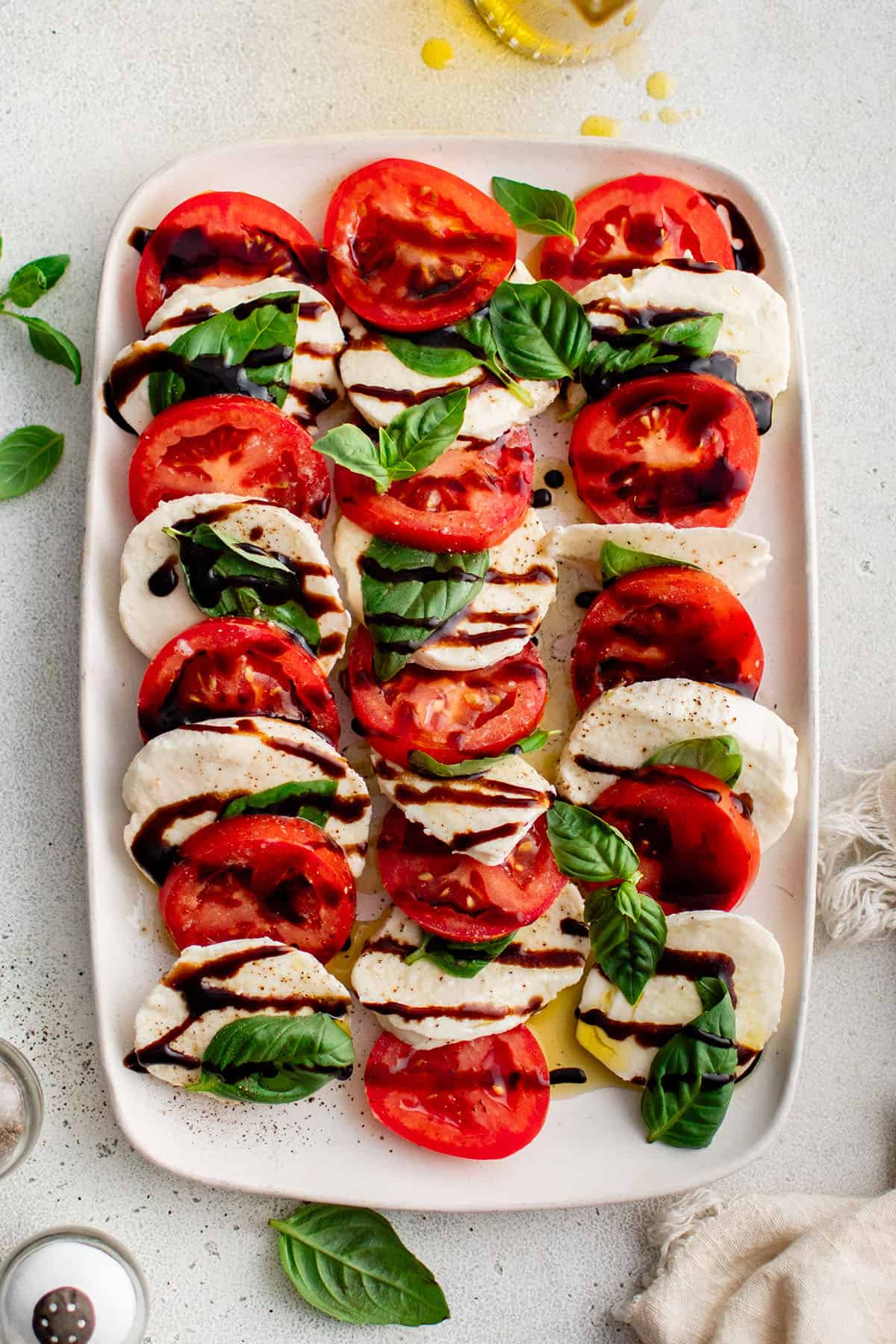 photo of Caprese salad layered on a serving plate