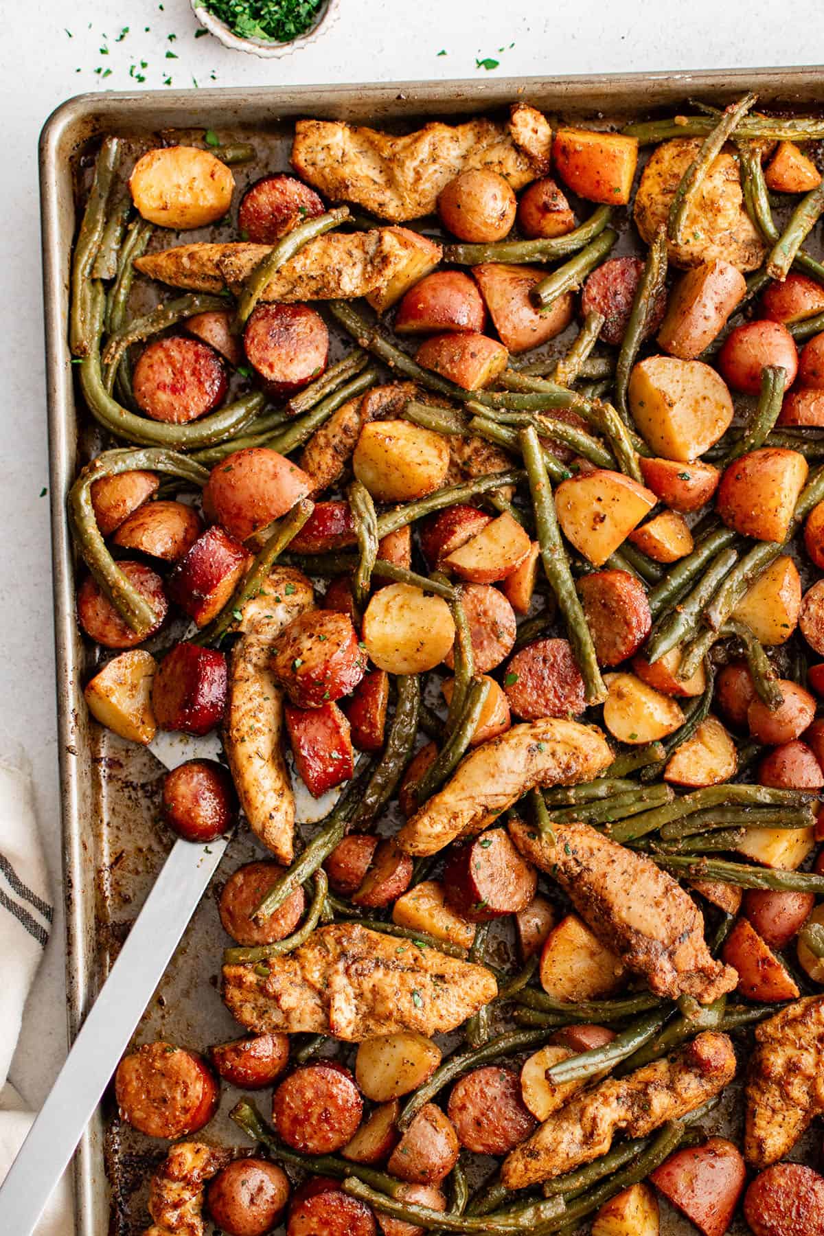 chicken sausage and vegetable dinner on a sheet pan